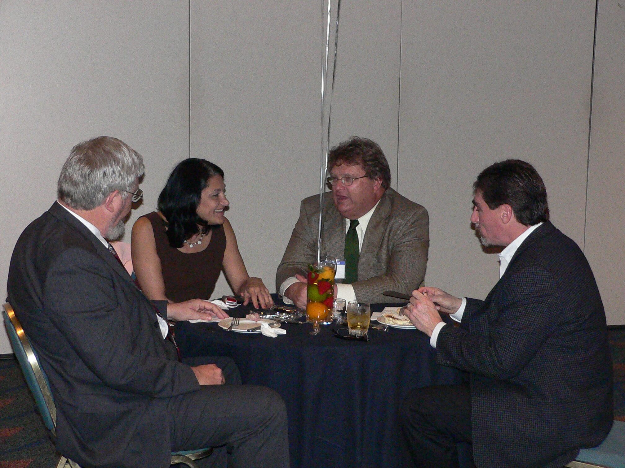 4 lawyers at CLS 30th Anniversary eating