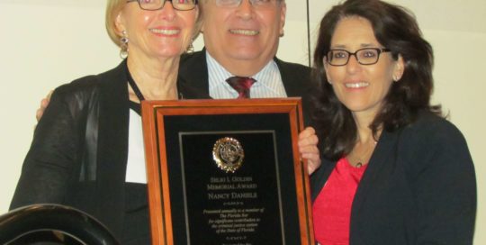 Nancy Daniels with Carlos Martinez & Judge Angelica Zayas photo